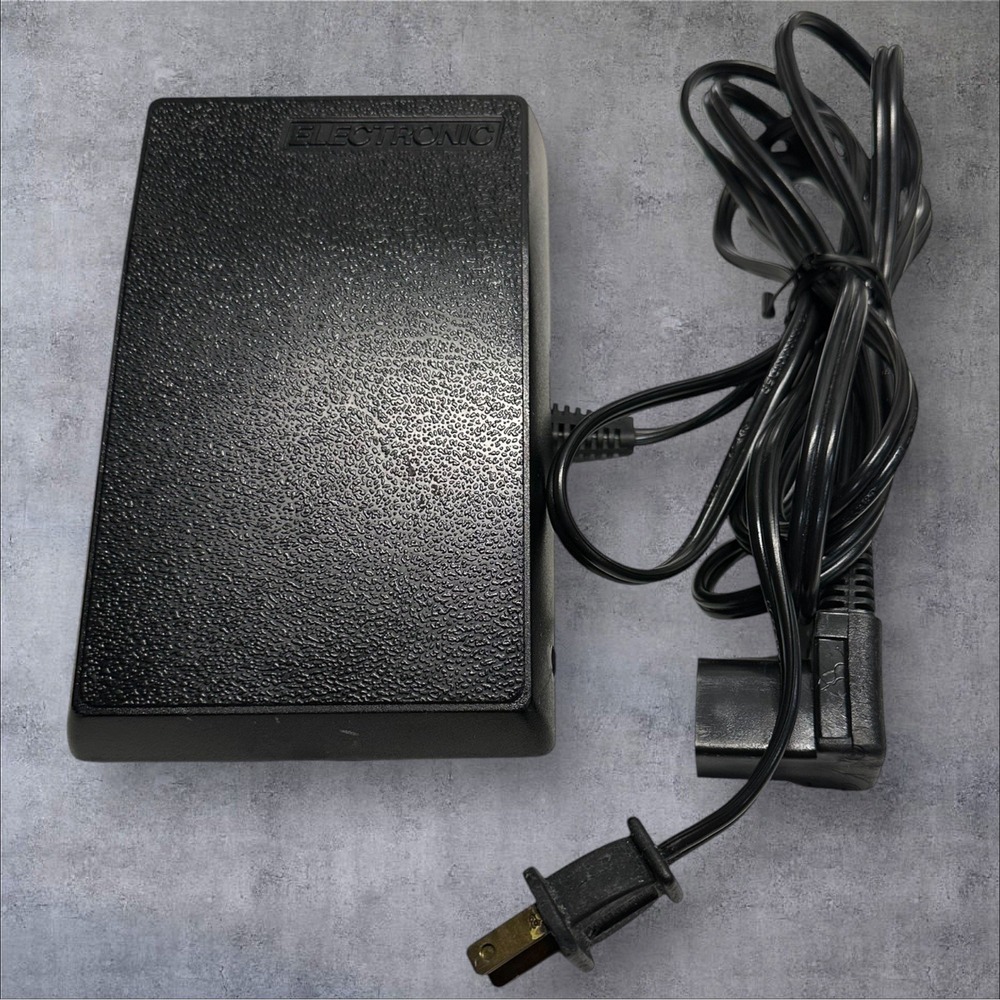 Black Foot Pedal Power Supply for Video Game Consoles